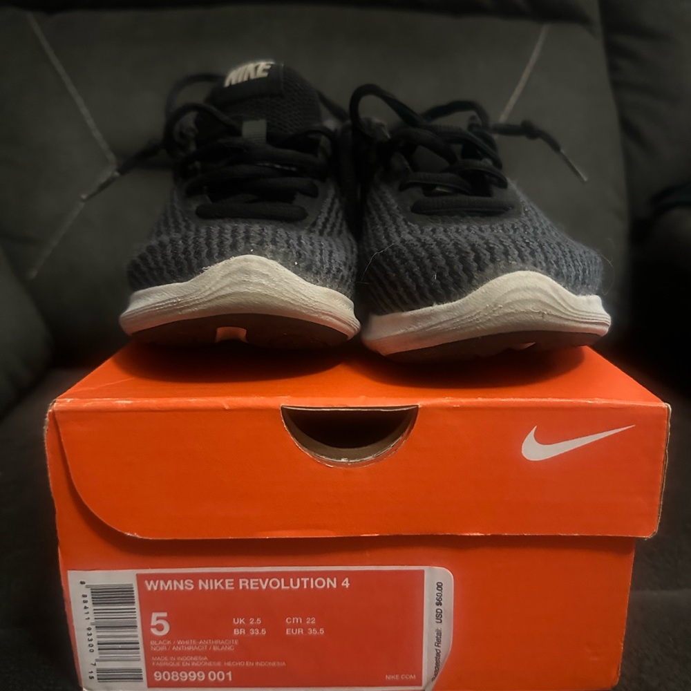 Nike Women's Revolution 4 Black Sneakers